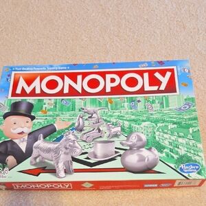 Hasbro Monopoly Game with Green and Red Box